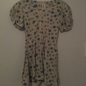 pale yellow mini dress with blue flower details